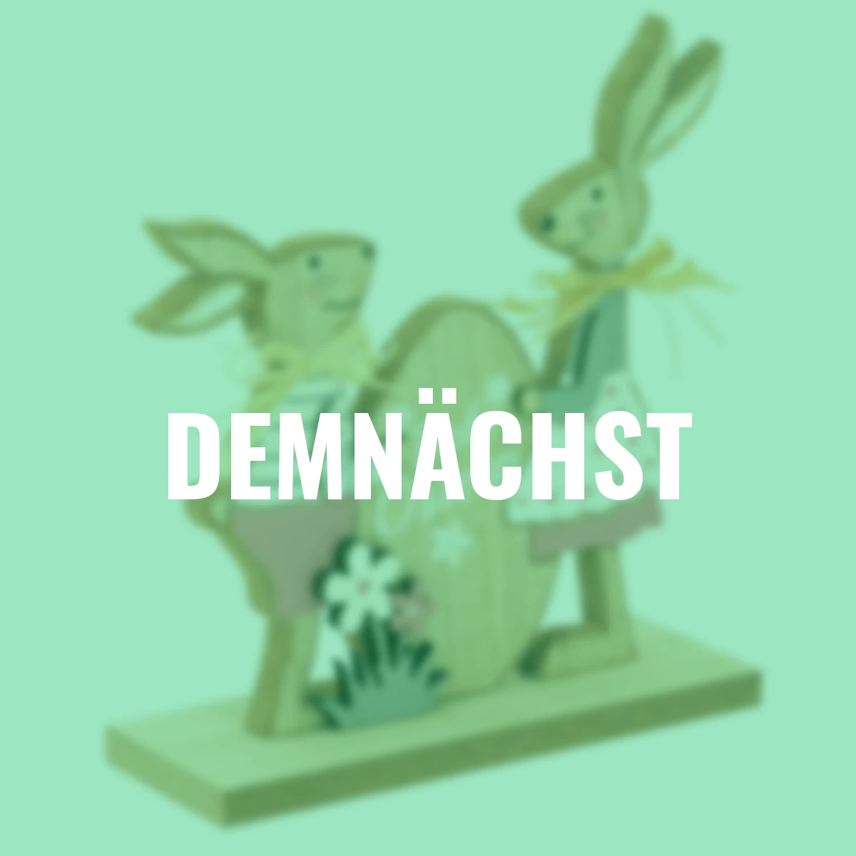 Deko-Osterhasen mit Osterei