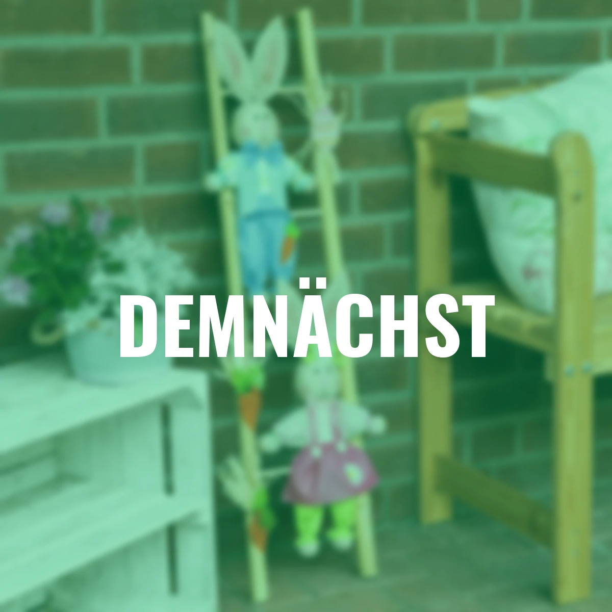 Deko-Osterhasen auf Holzleiter